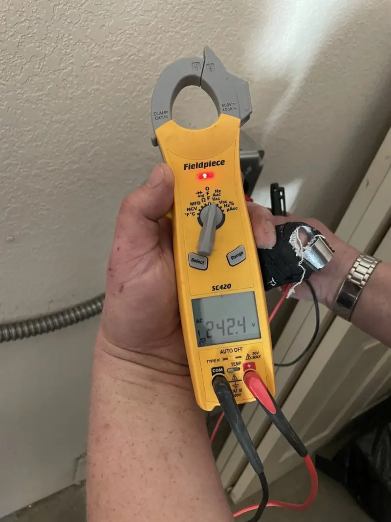 Voltage testing with clamp meter during Electrical Installation Services in Hastings-on-Hudson